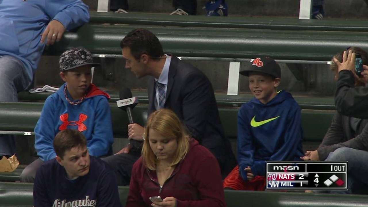 Young fan on trading ball