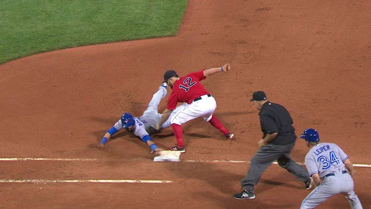 Bautista safe at first stands