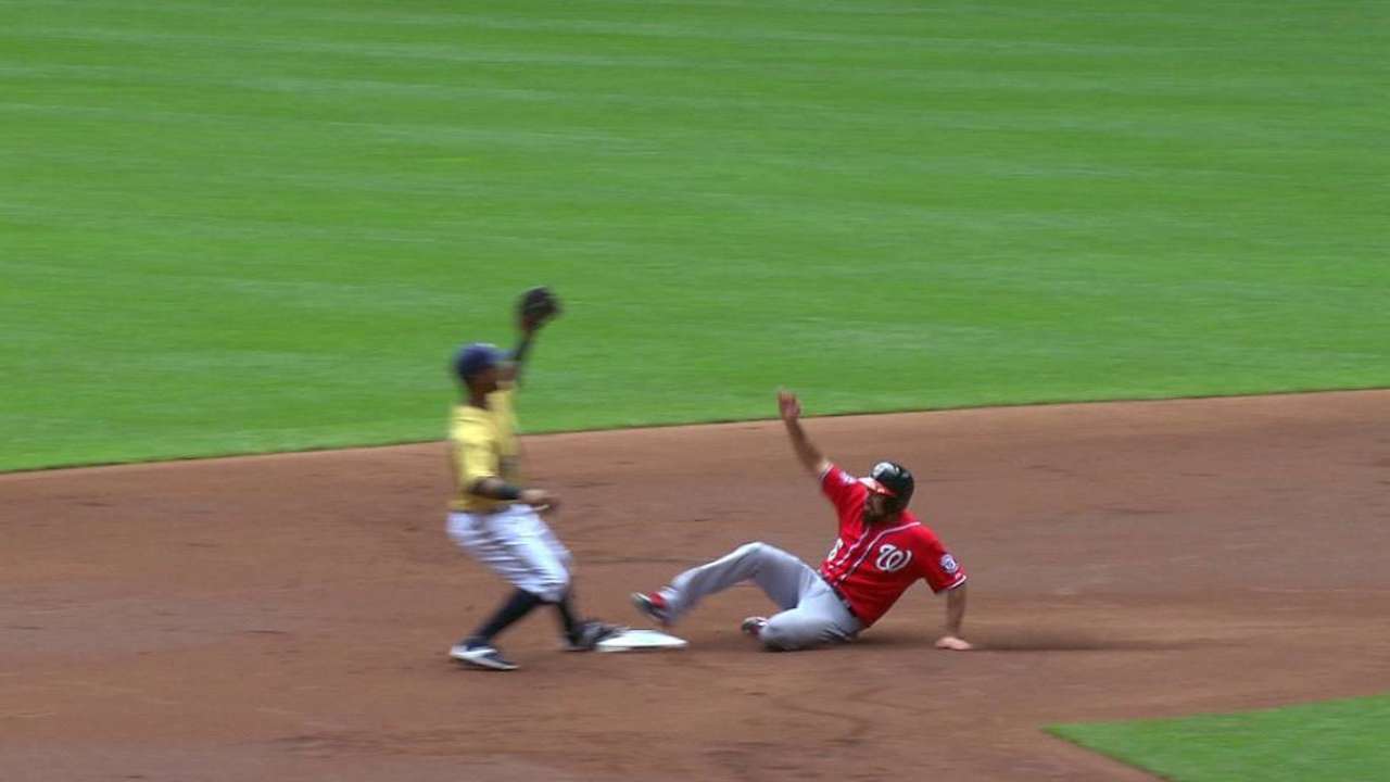 Gennett throws out Rendon