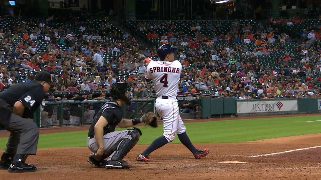 Springer's 2 HRs help lift Astros past Rockies