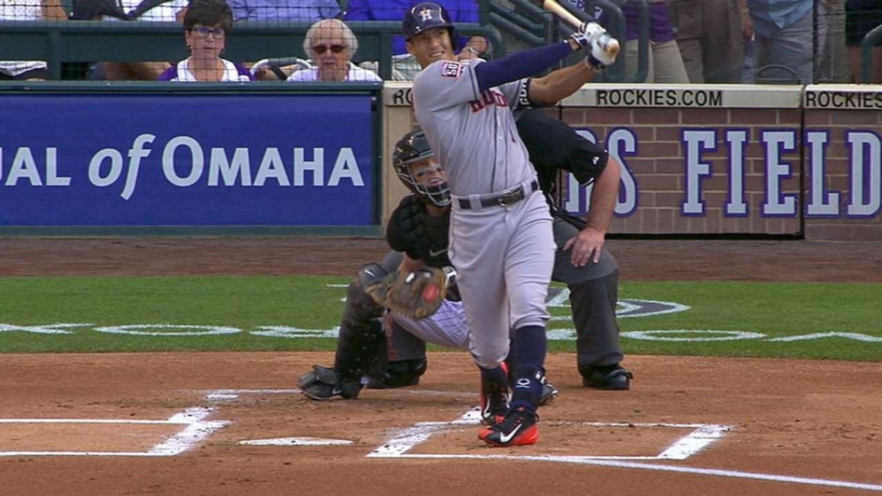 Correa ignites power surge as Astros top Rox