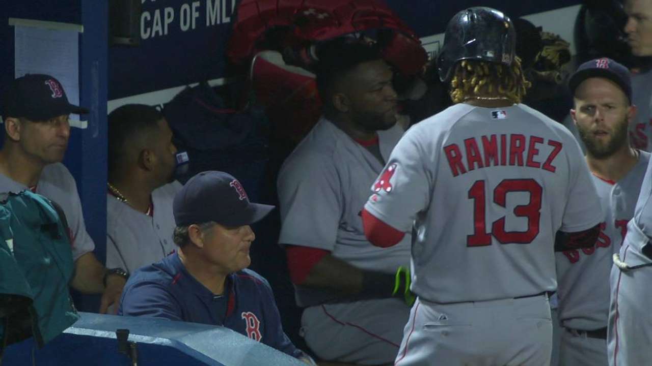 Holt scores on double play