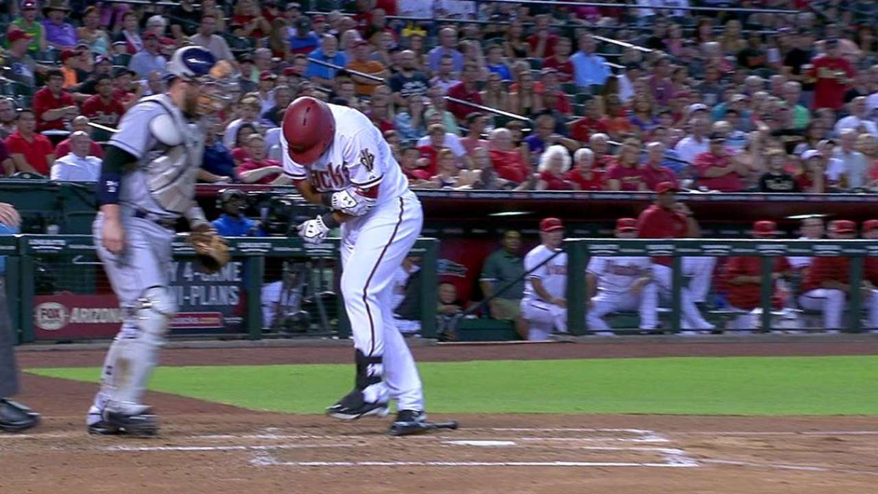 Tomas hit by a pitch, stays in
