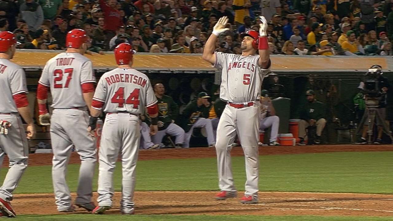 Slam continues Pujols' resurgence