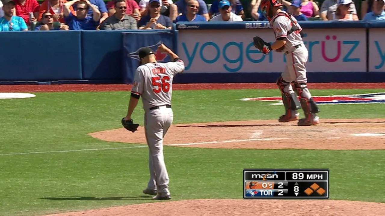 O'Day escapes bases-loaded jam