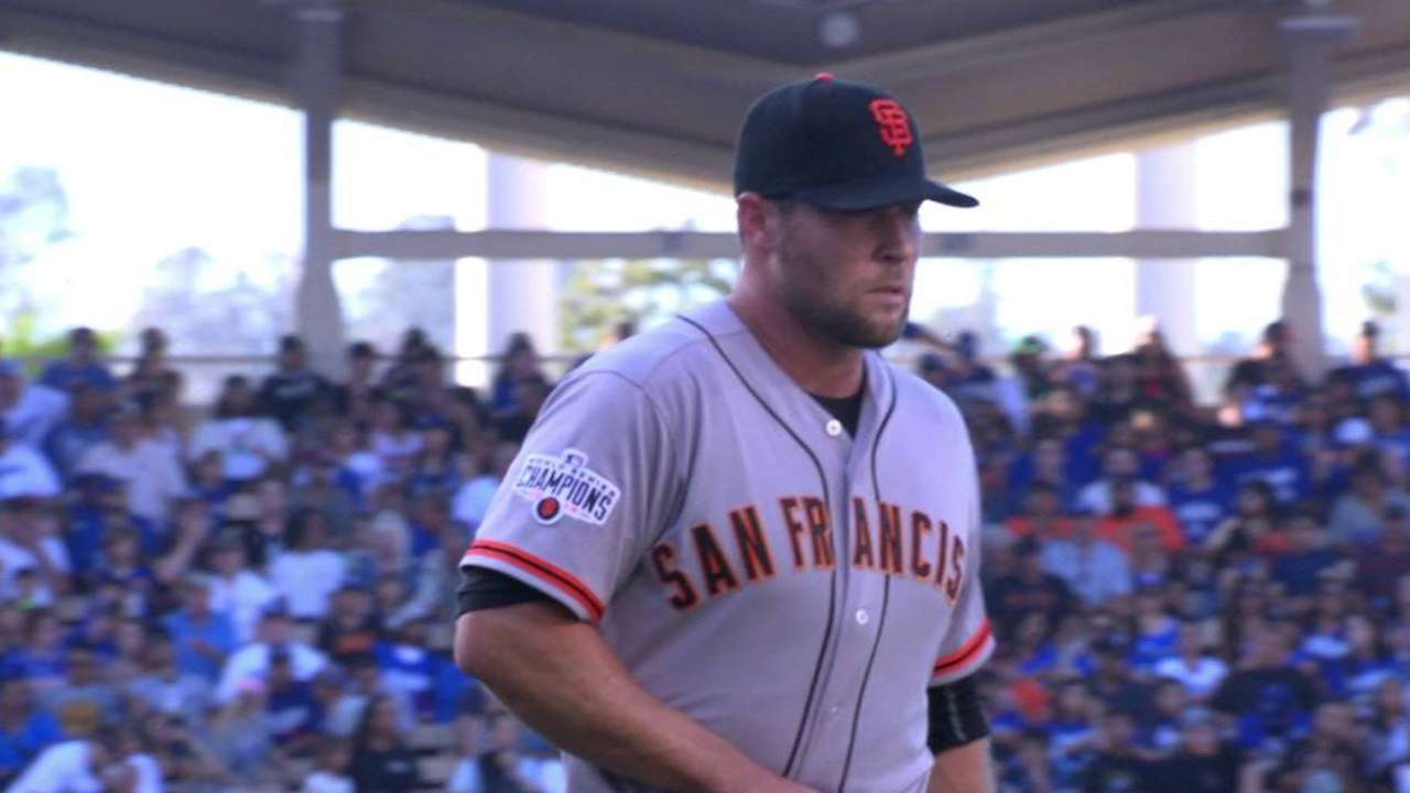 Strickland strikes out Puig