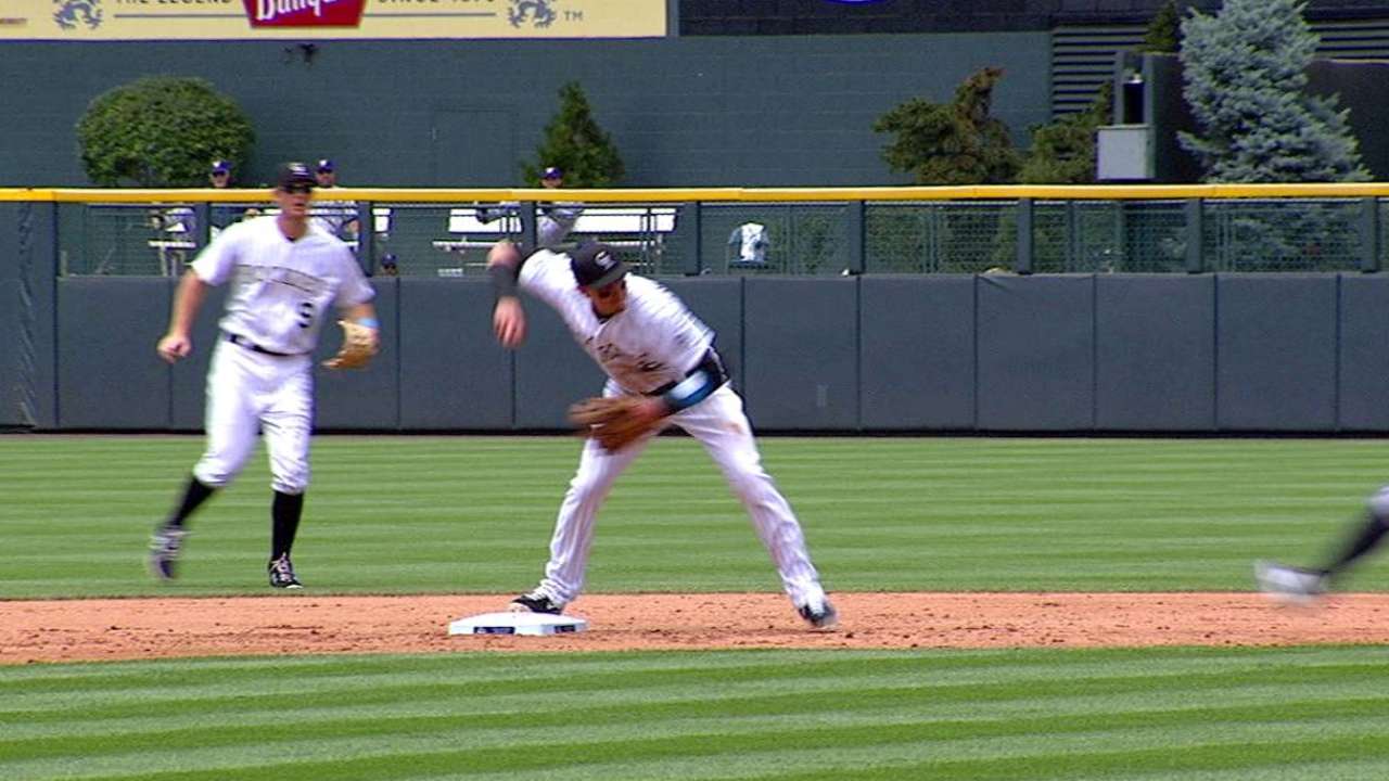 Rusin shows improvement, beats Brewers