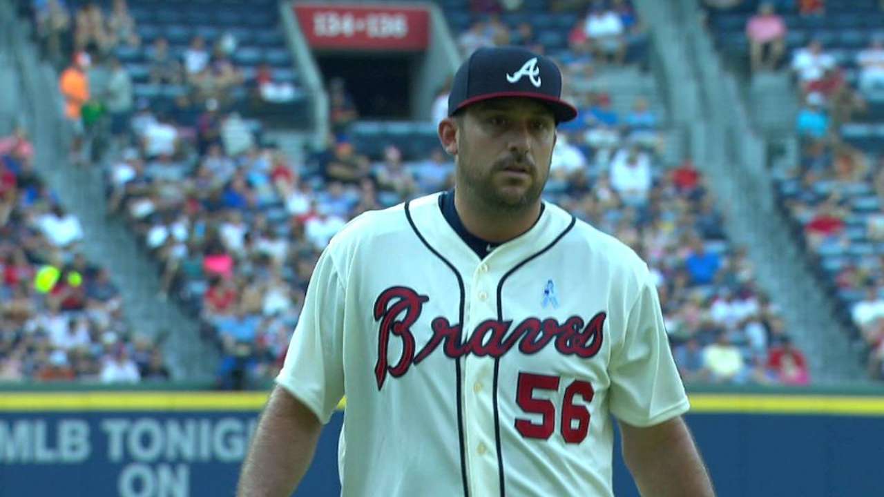 Braves DFA Masset, Eveland