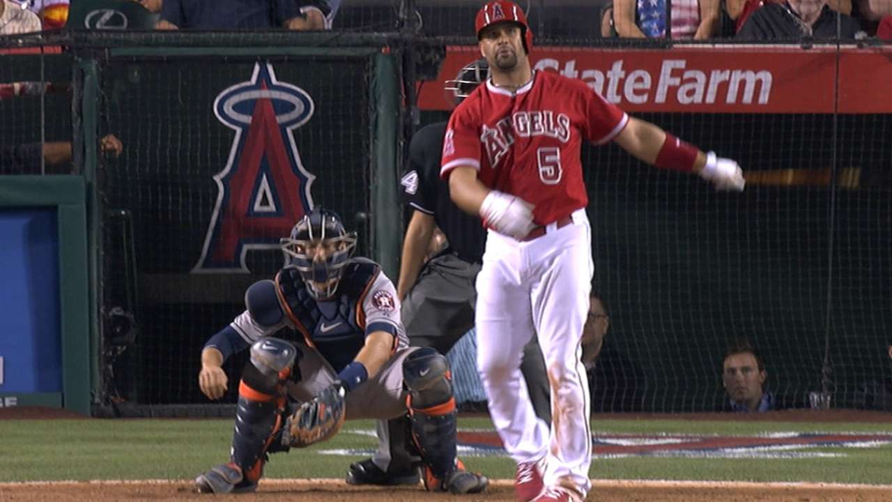 Must C: Pujols goes deep twice