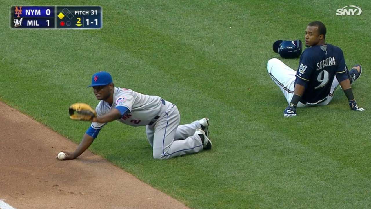 Herrera, Segura collide at first
