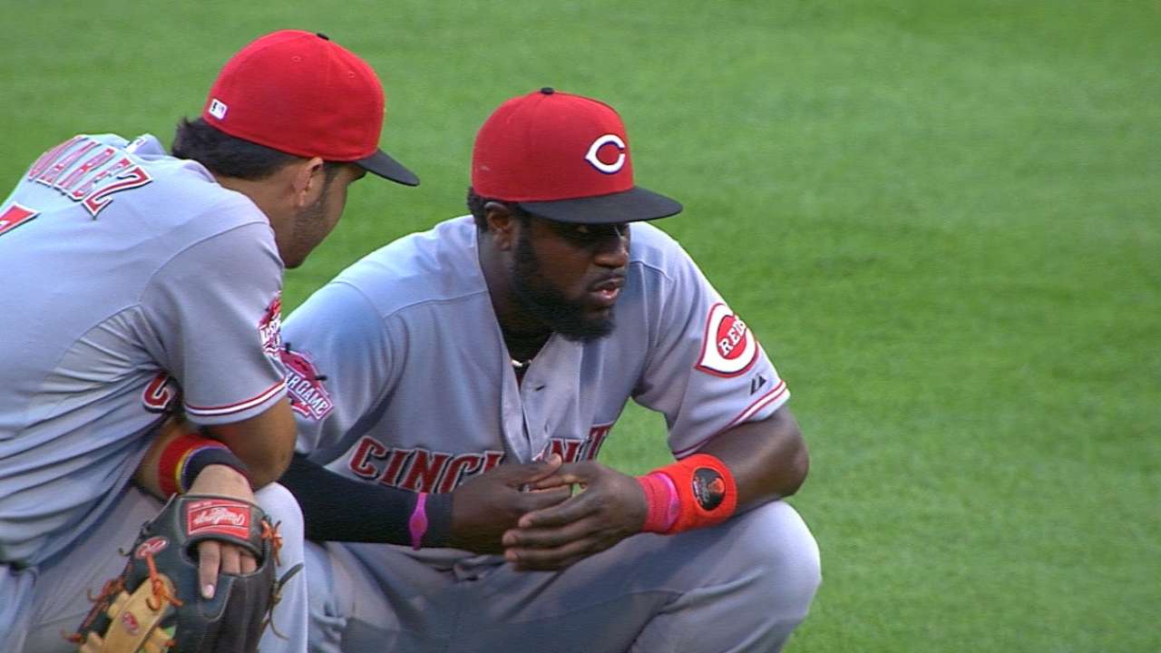 Reds' Phillips sits out with left thumb injury