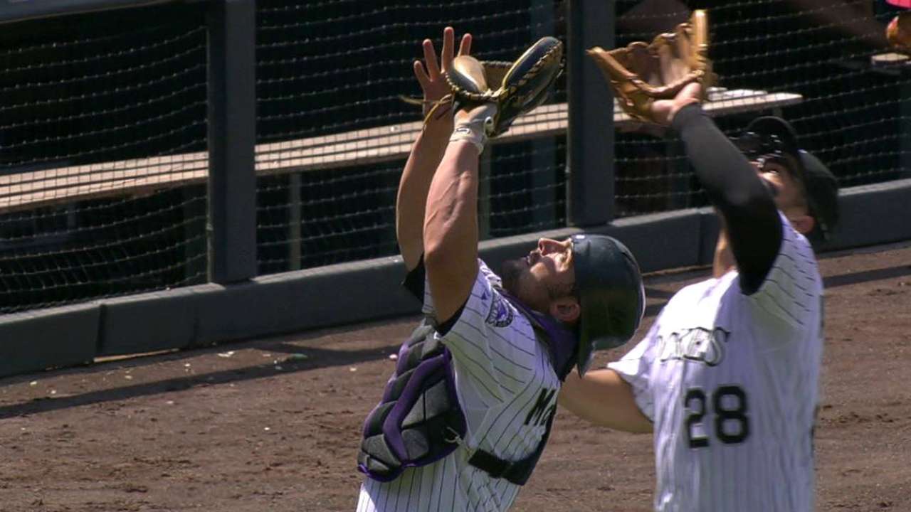 McKenry, Arenado collide for out