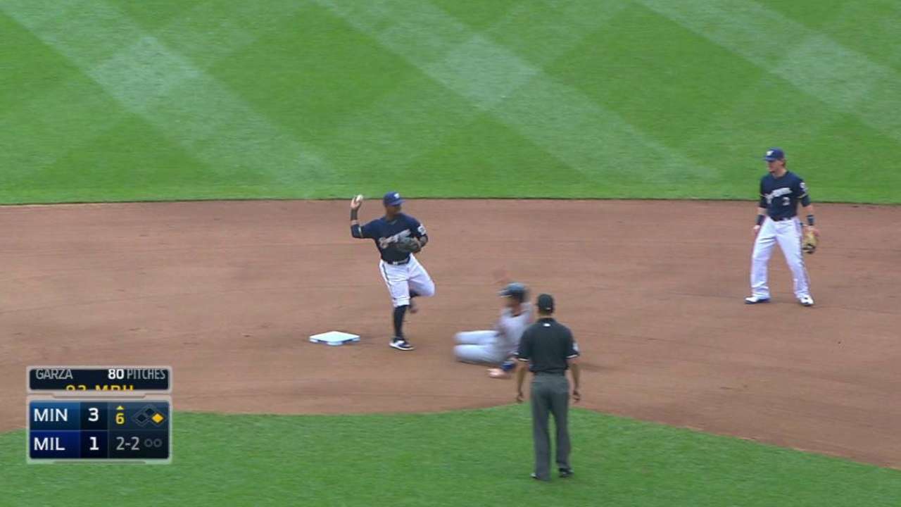 Brewers challenge play at first