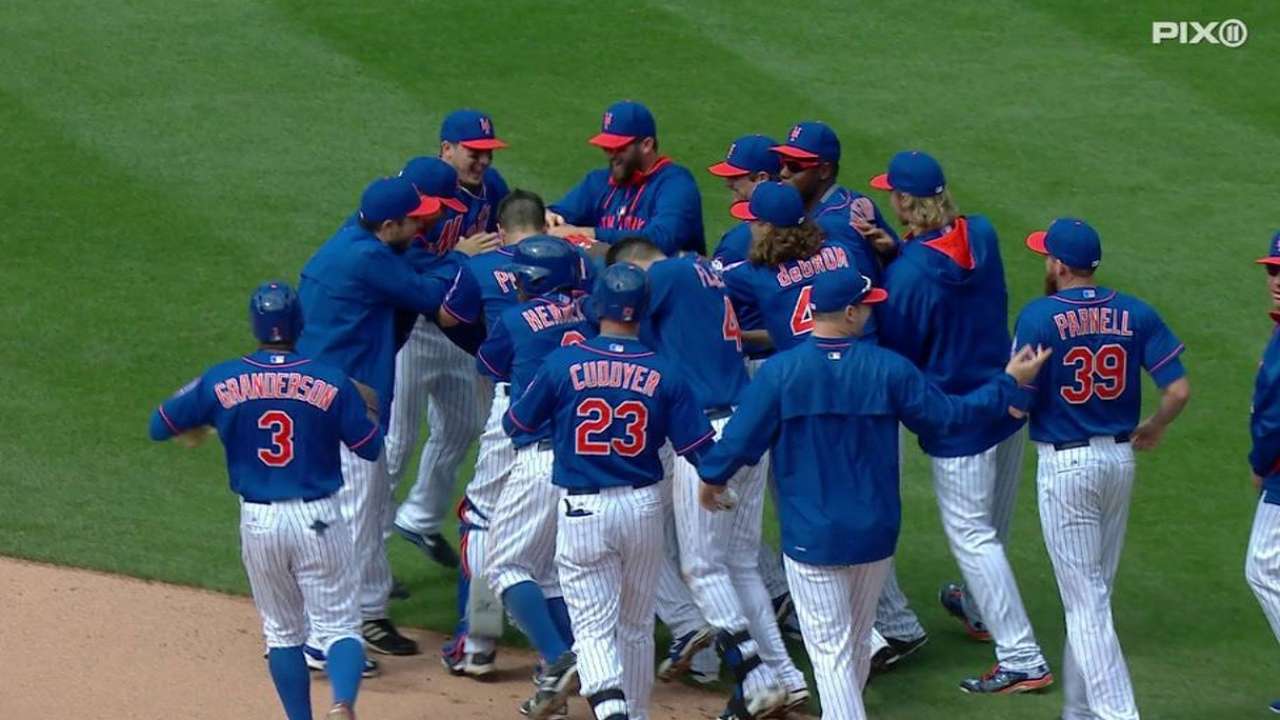 Mets ganan juego suspendido vs. Rojos en 13 entradas