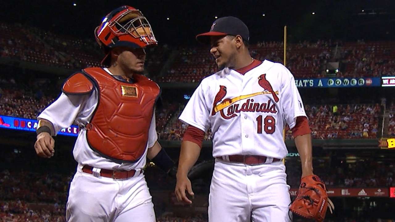 Martinez endures delays, wins