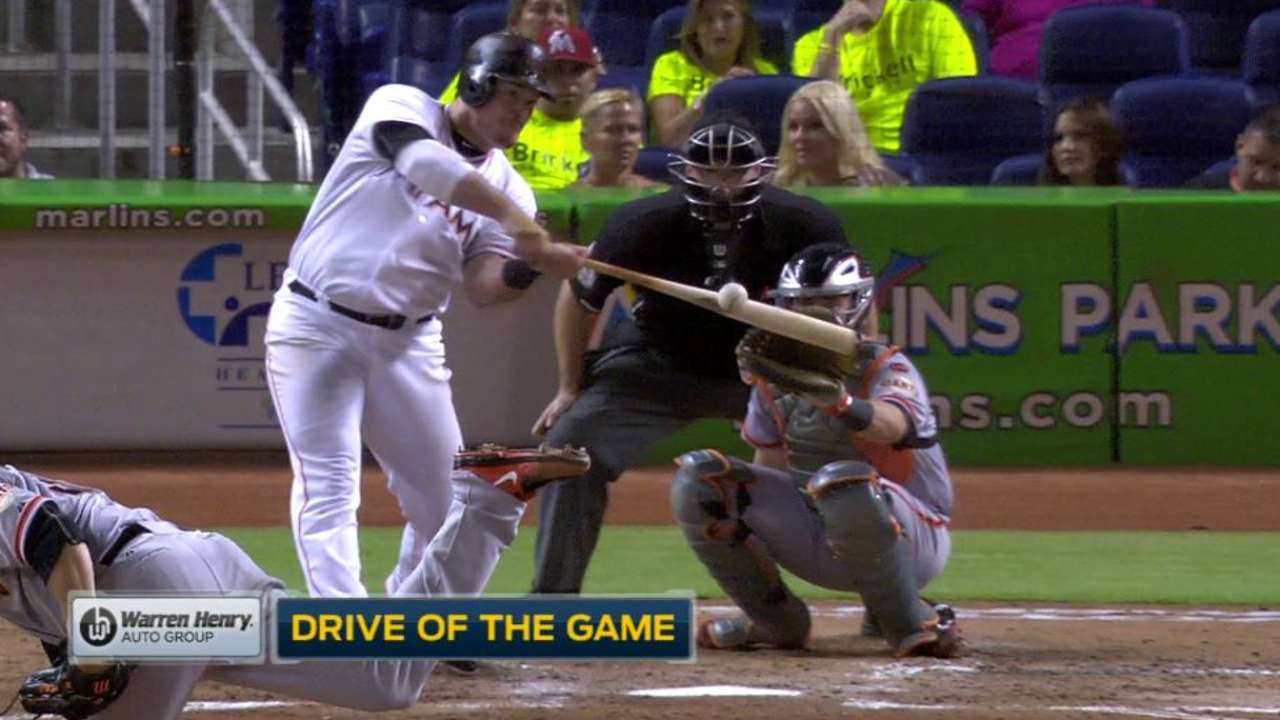 Marlins top Giants with homers inside and out