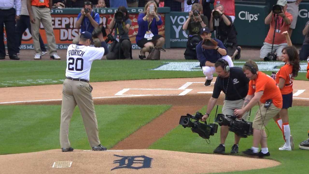 Harbaugh throws ceremonial first pitch