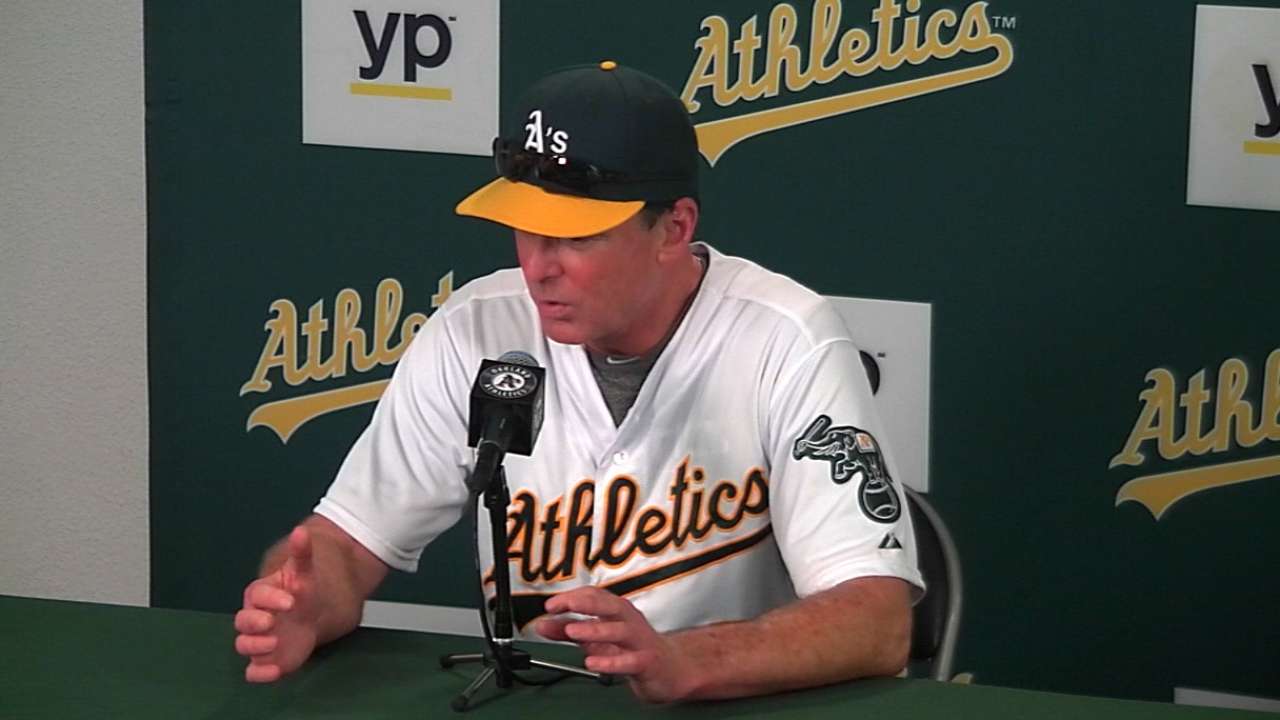 Hahn quiets Rox as A's take rubber game