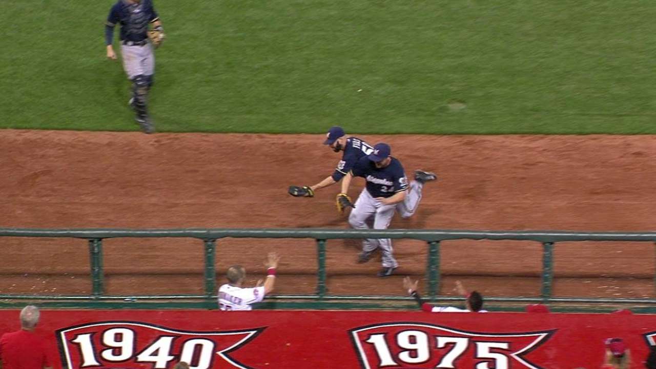 Fiers' tough catch, bumps Lind