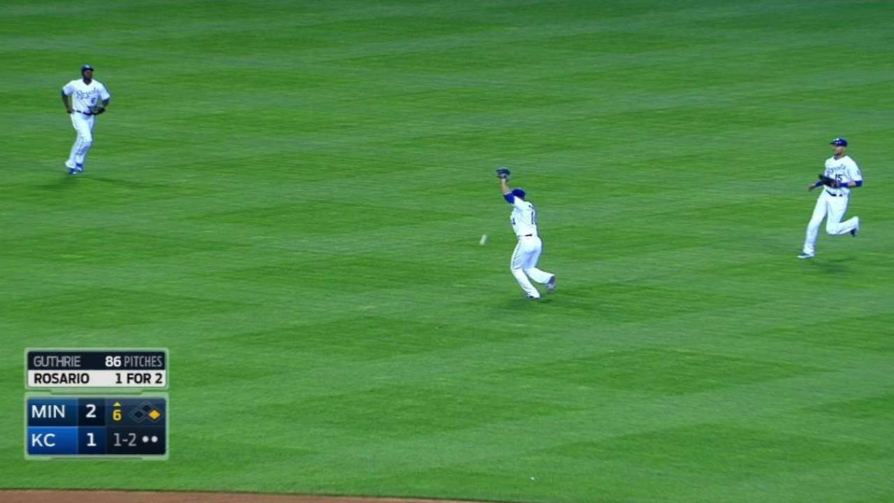 Rosario reaches on dropped ball