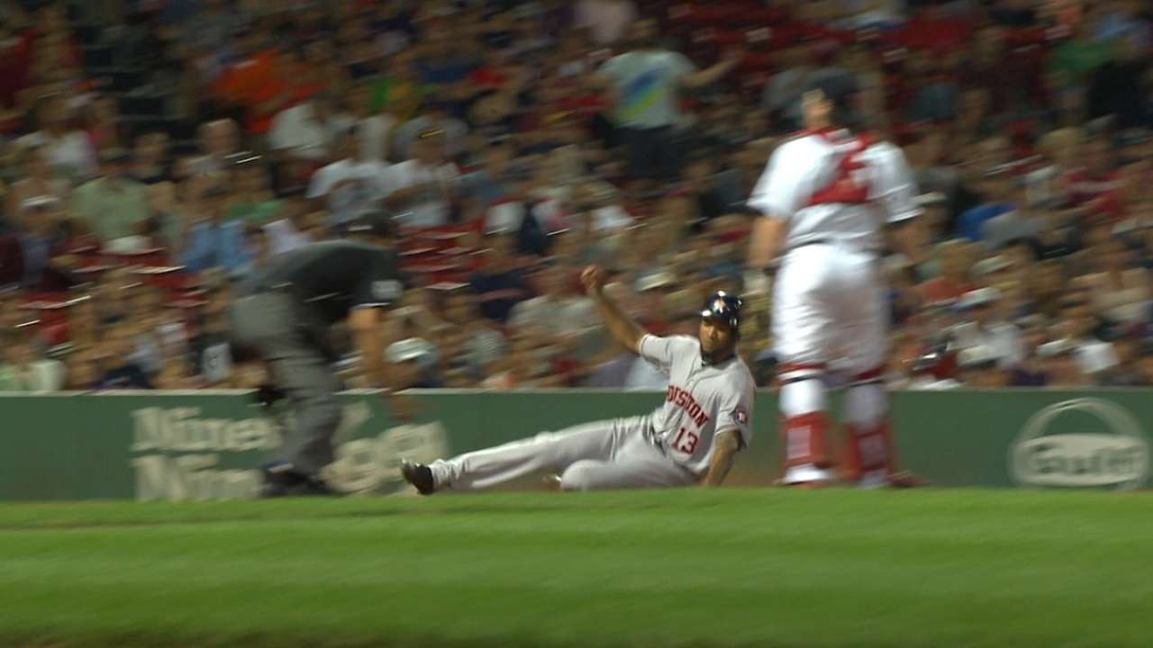 Santana swipes home in the 10th
