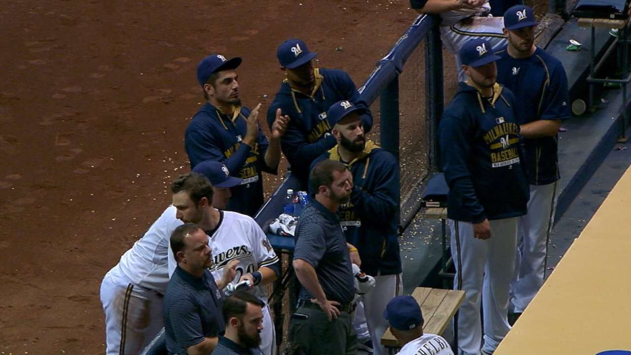 Braves, Brewers concerned for injured fan