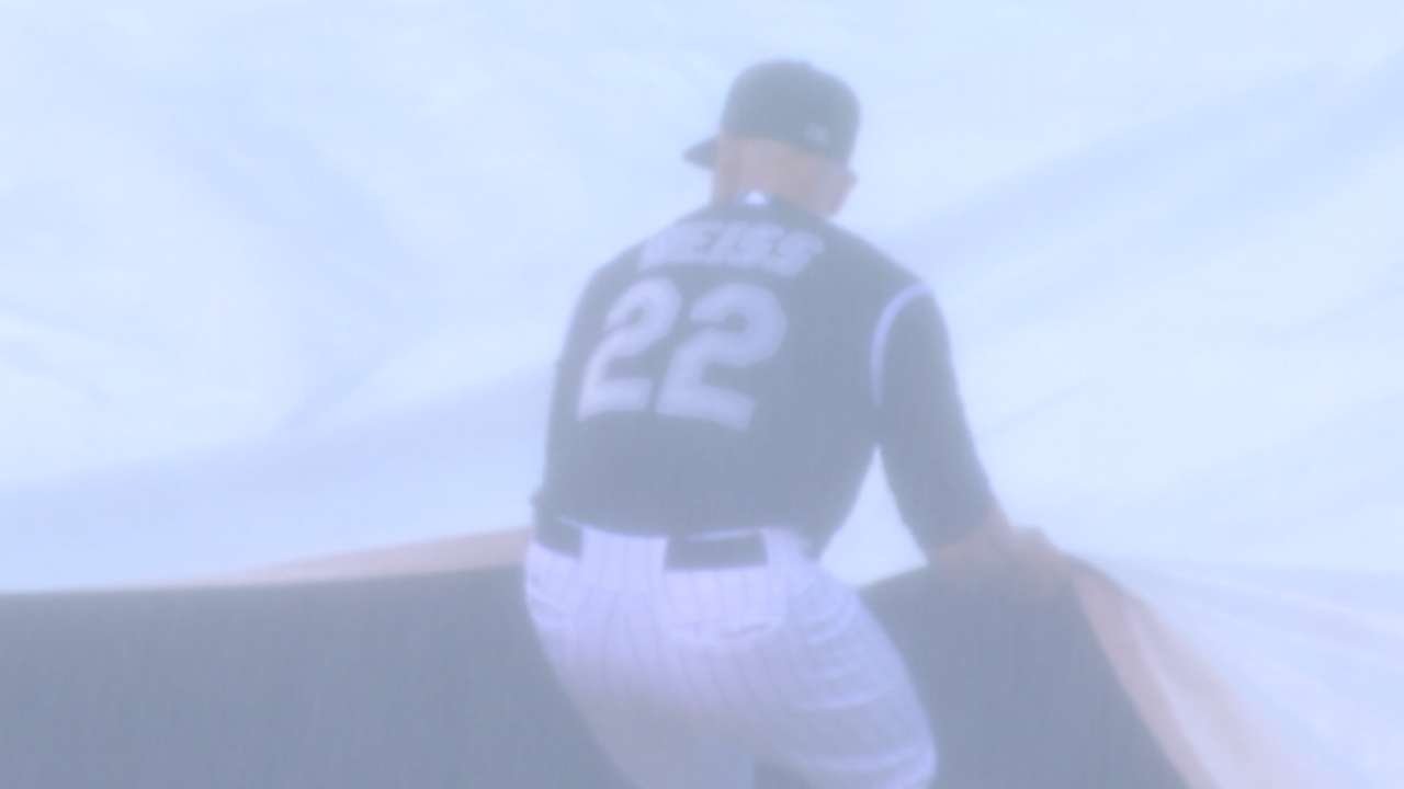 Weiss, Rox help tame tarp