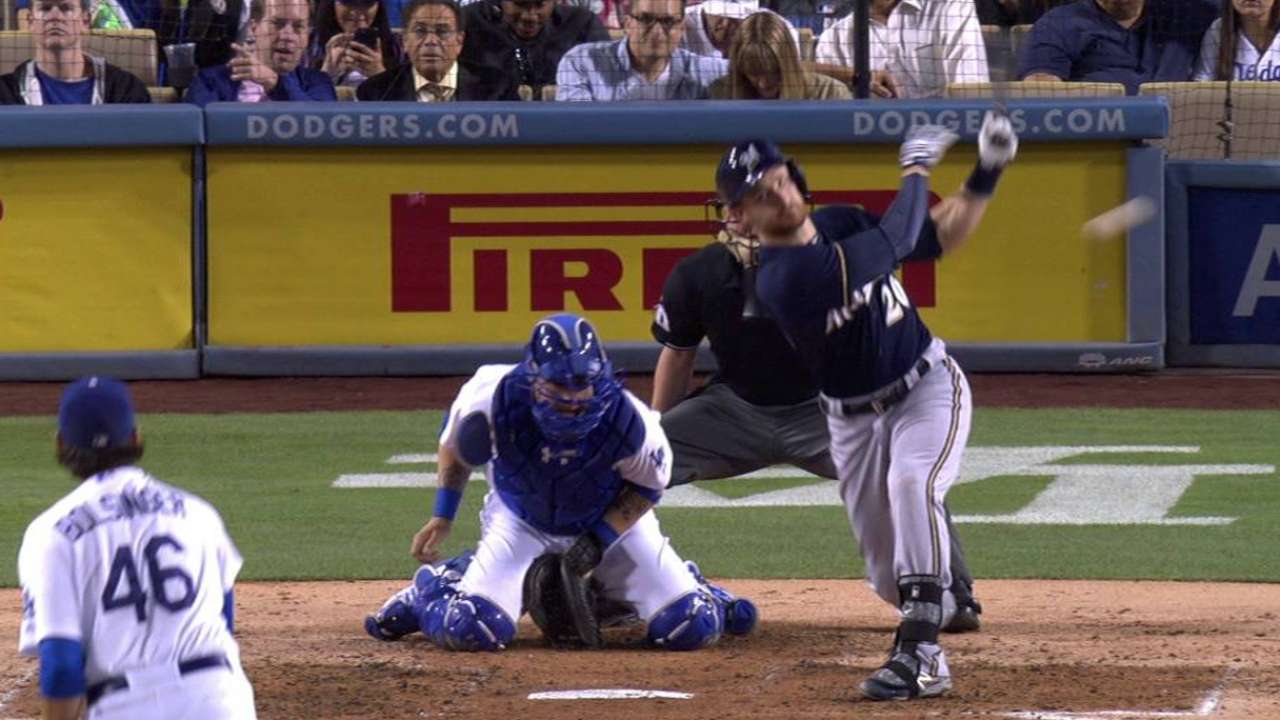 Gennett scores on wild pitch