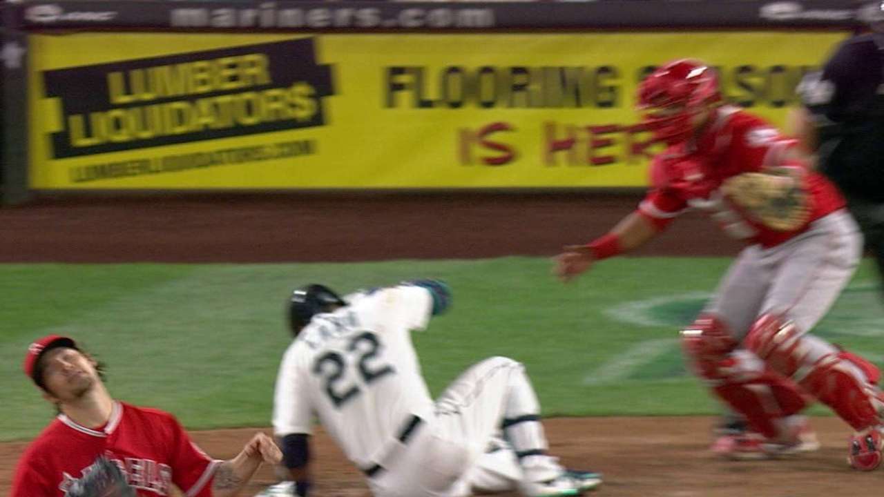 Cano hit by a pitch, stays in