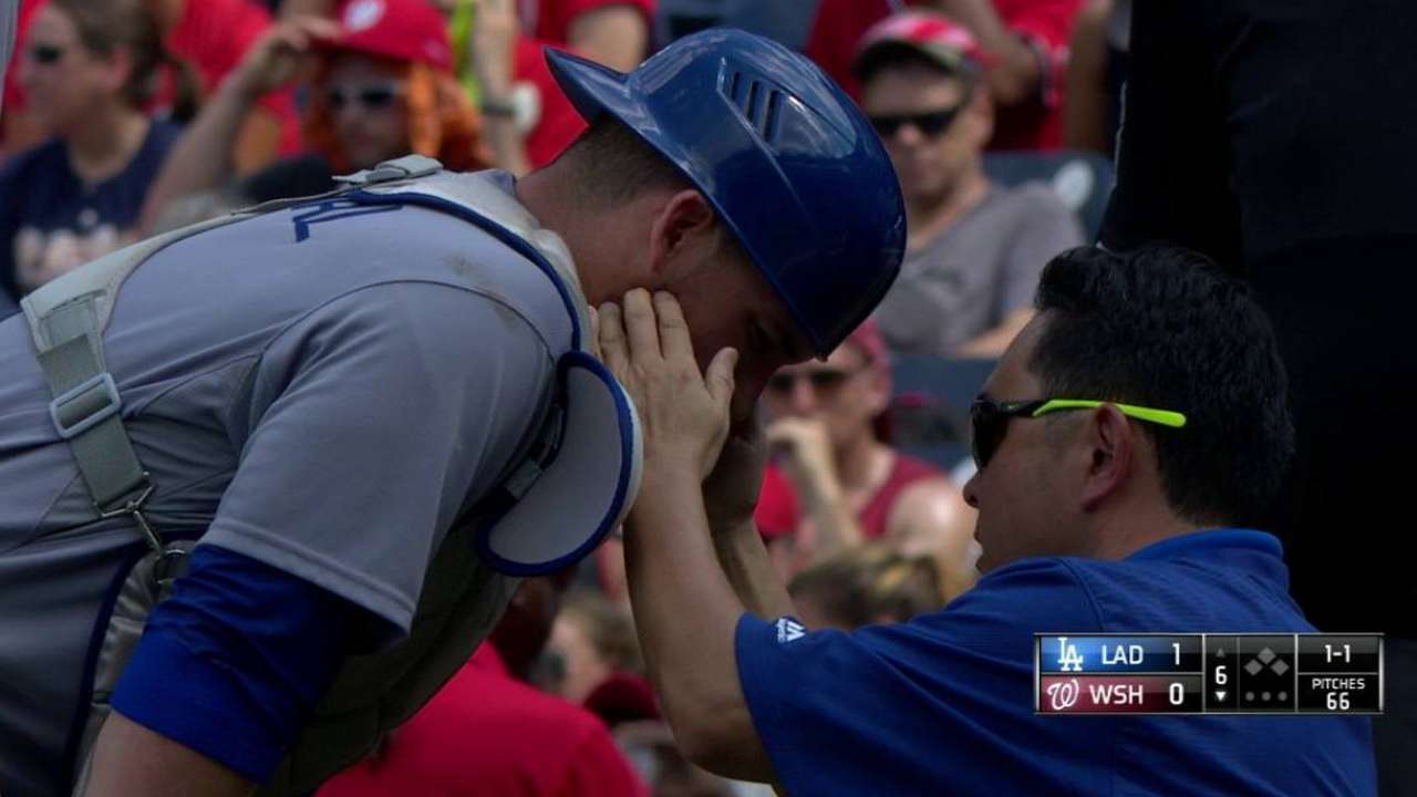 Grandal takes foul off mask; X-rays negative