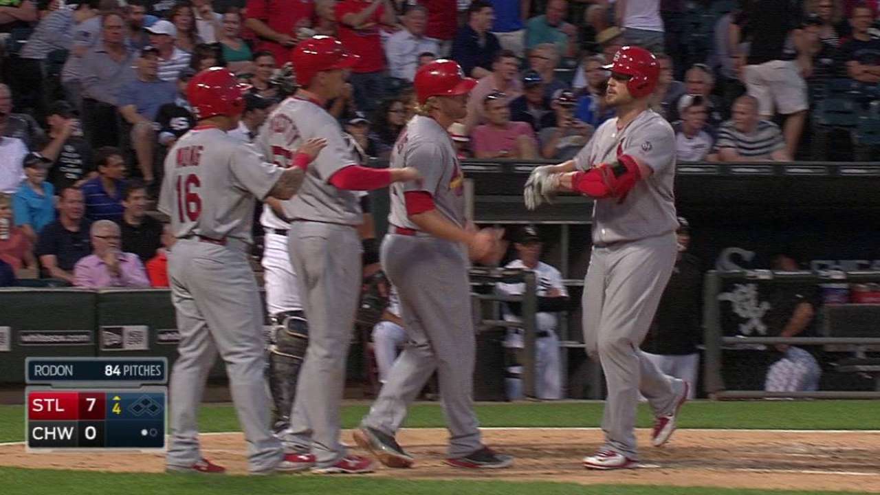 Holliday's slam lifts Cardinals over White Sox