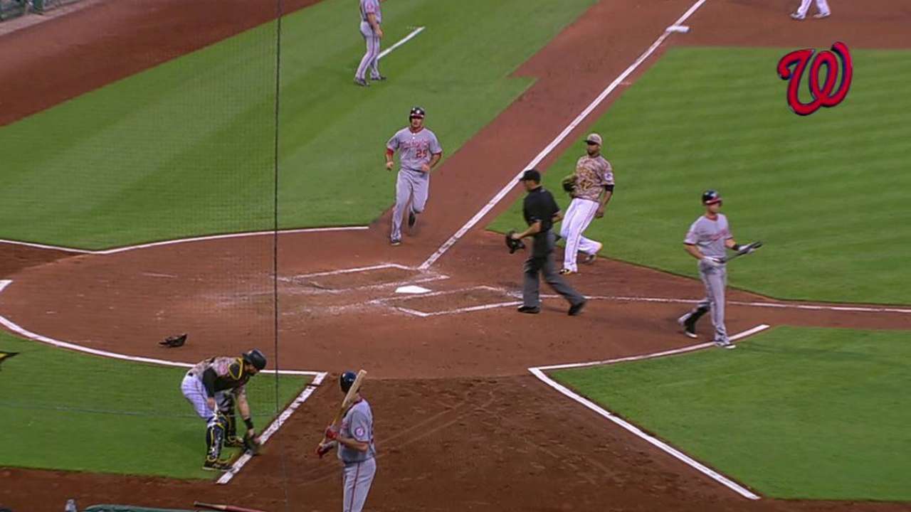 Robinson scores on wild pitch