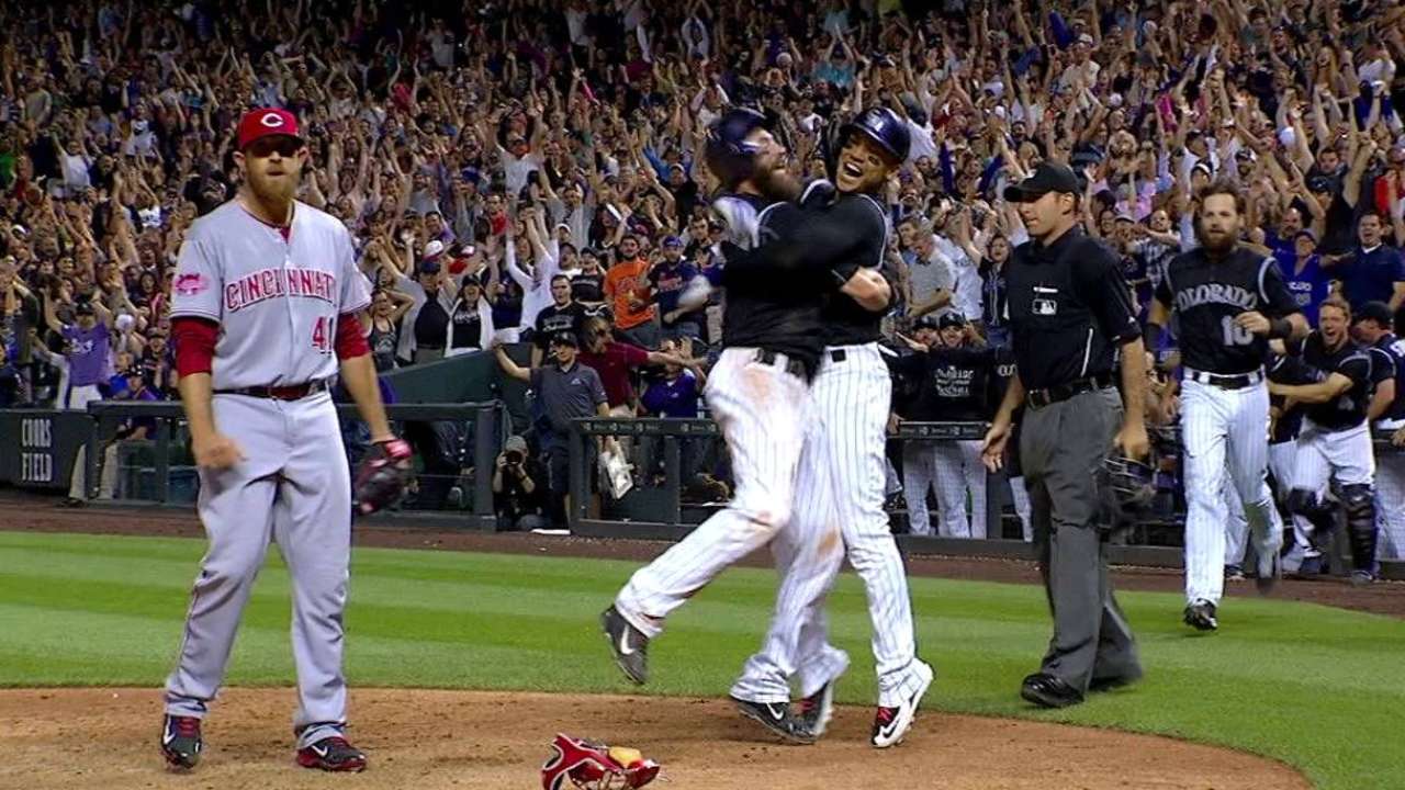 Rockies top Reds on walk-off wild pitch