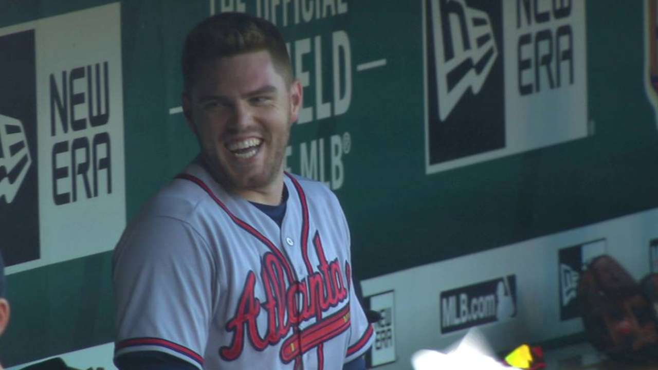 Freeman arrives in dugout