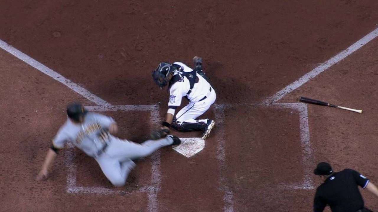 Ishikawa is safe at the plate