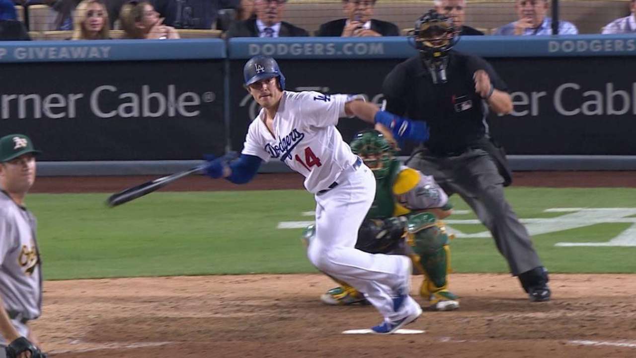 Dodgers score 8 two-out runs to drop A's