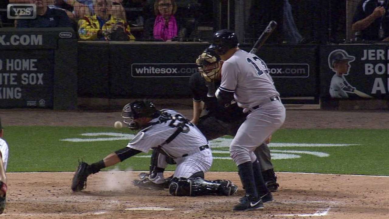 Young scores on wild pitch