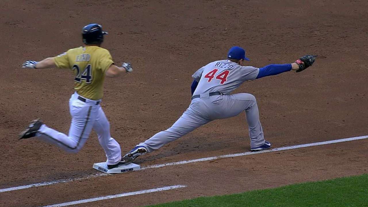 Umpires review play at first