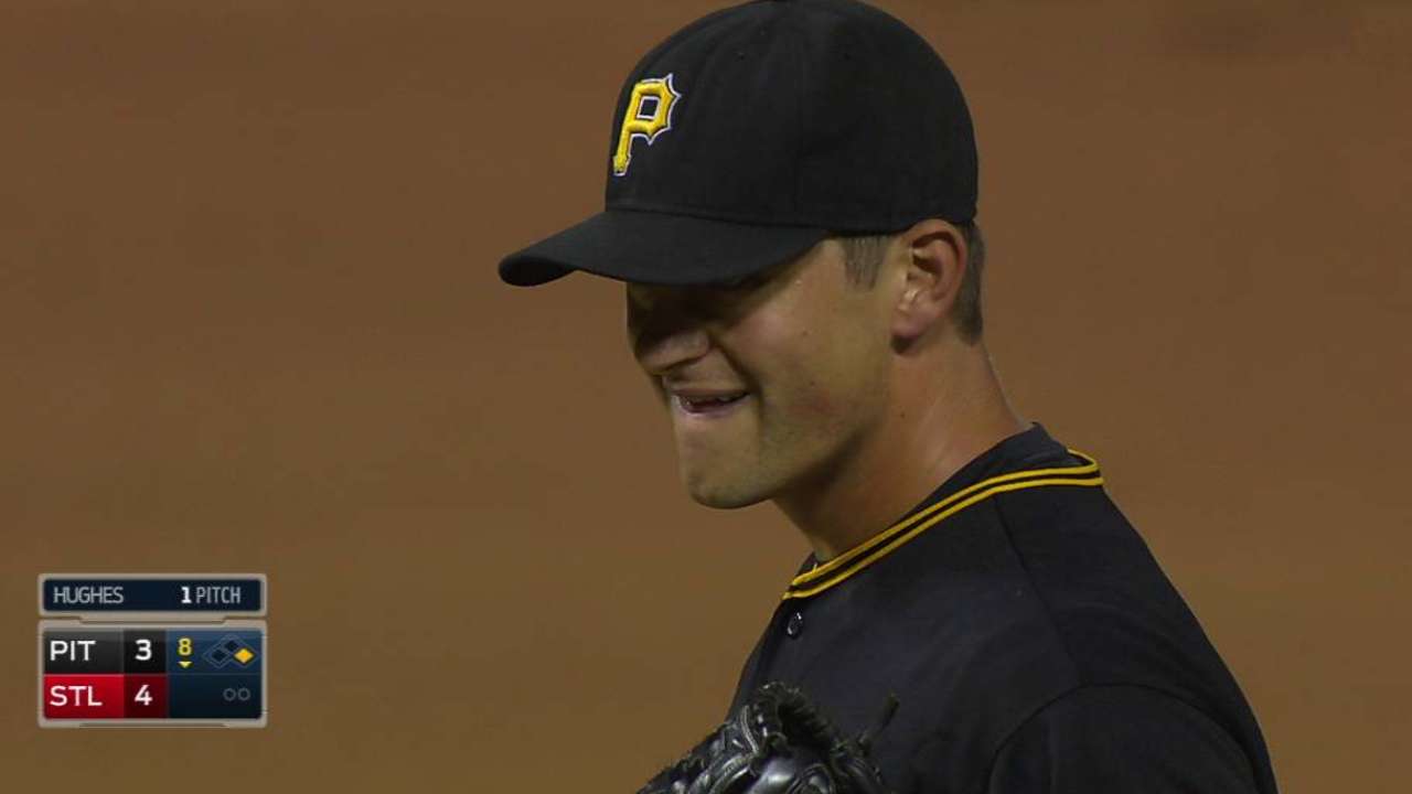 Hughes takes liner to chin, stays in game