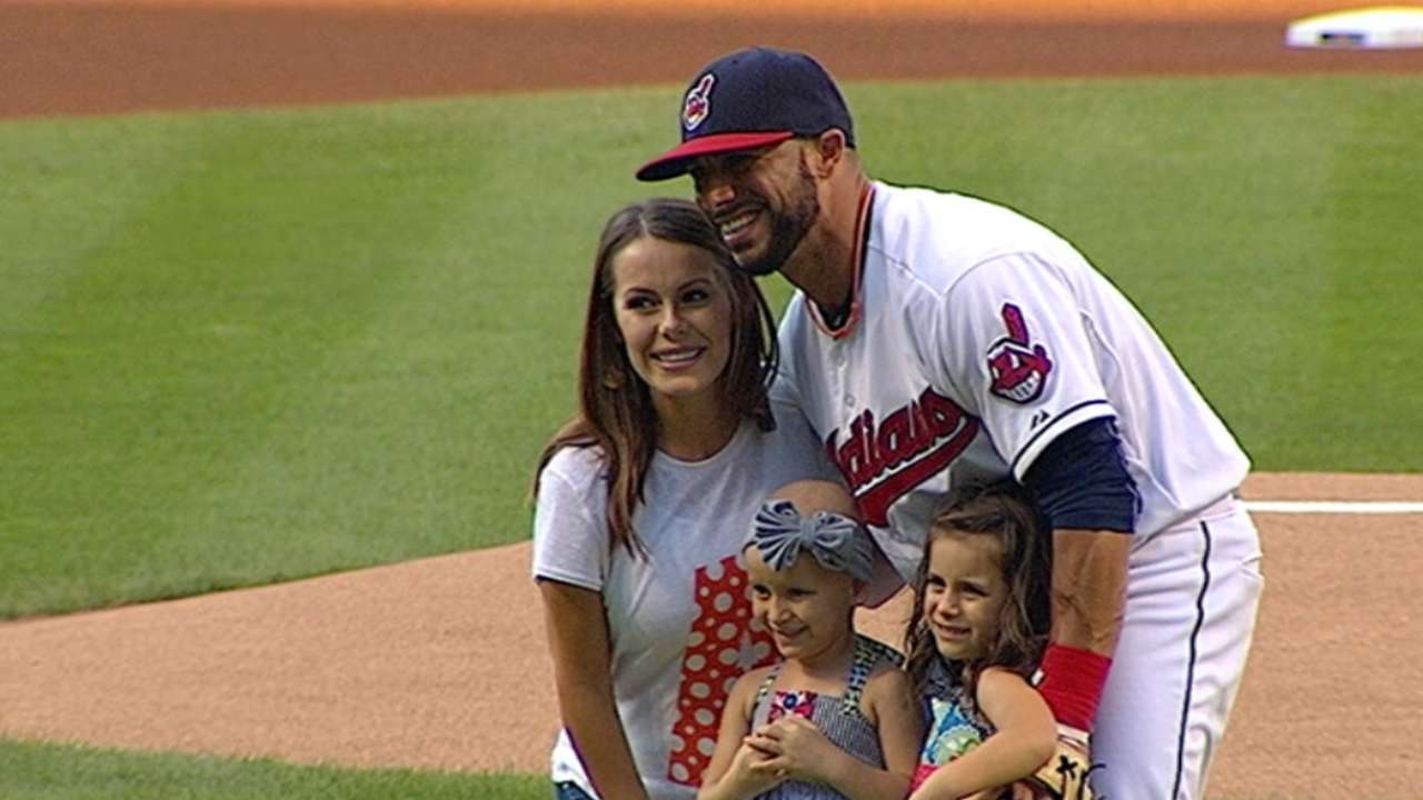 Aviles daughters' first pitch