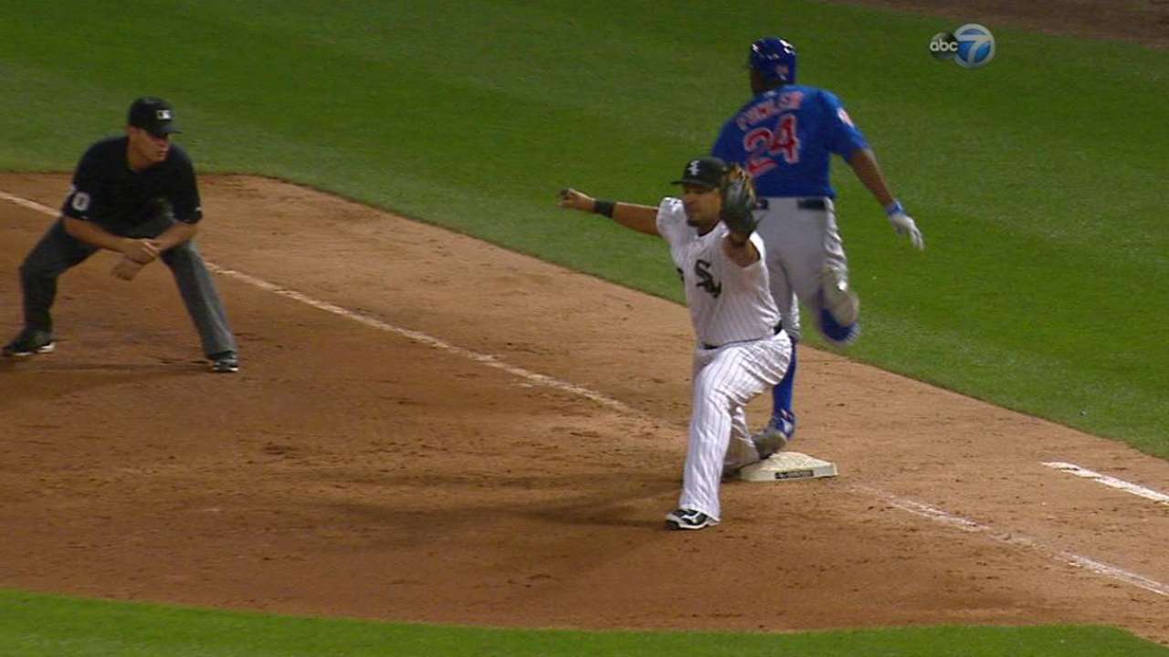 Fowler safe at first on review