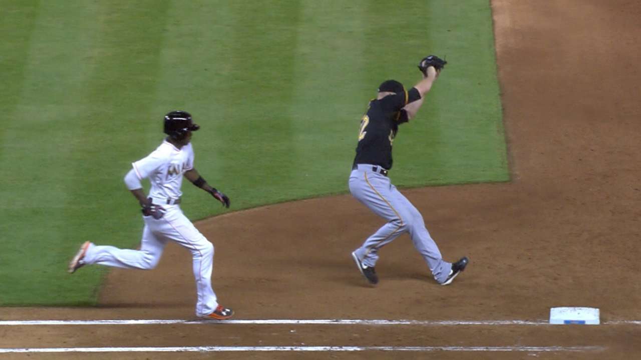 Pirates down Marlins behind strong Happ