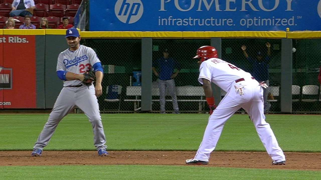 Phillips engages in basepath dance with A-Gon