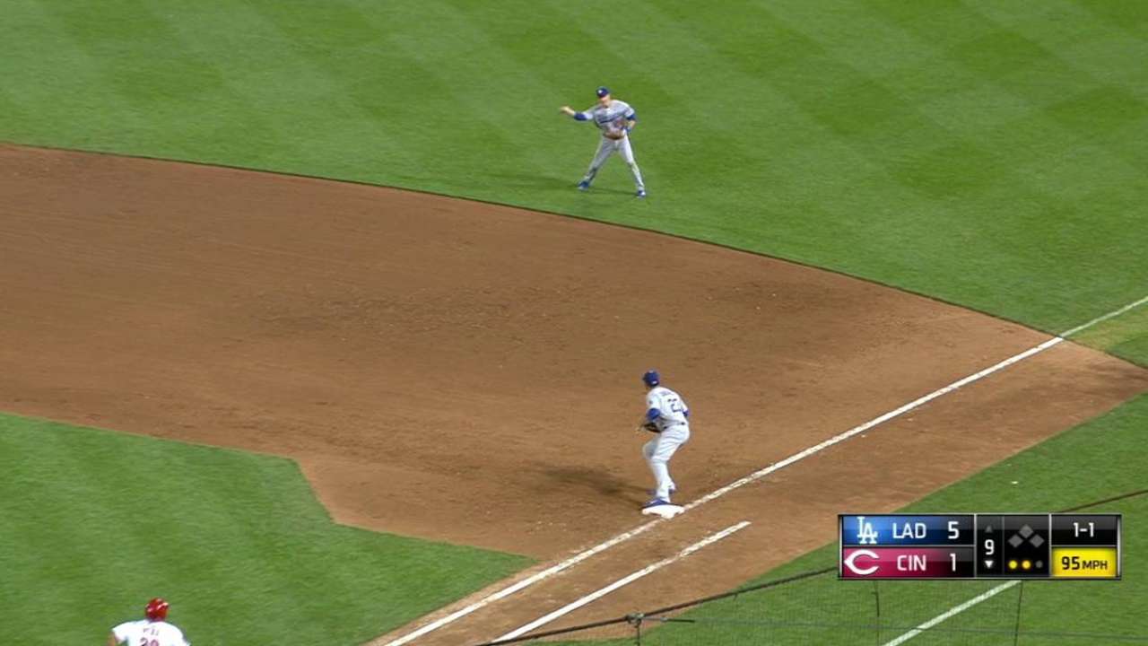 Utley takes preparatory grounders at third