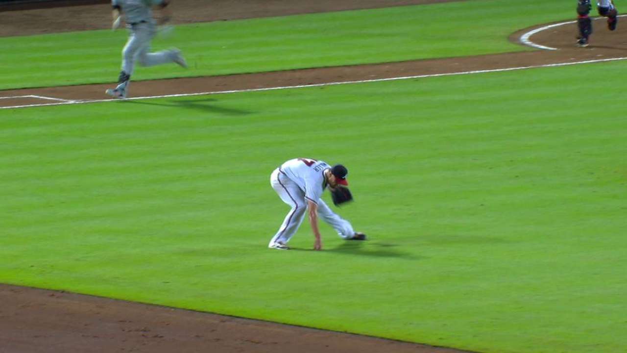 Miller recovers to get the out