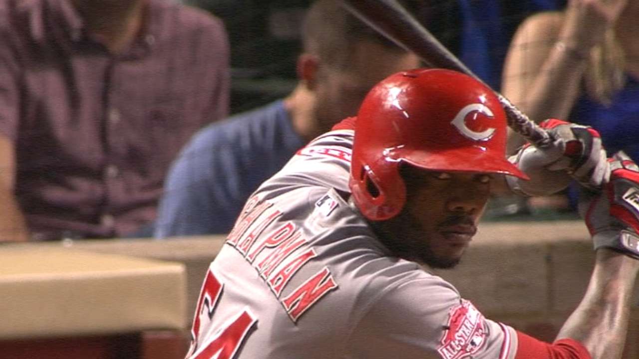 Reds bury Cubs with six-run ninth in opener