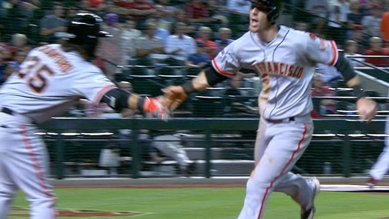 Hudson's pitching, pop lead Giants past D-backs