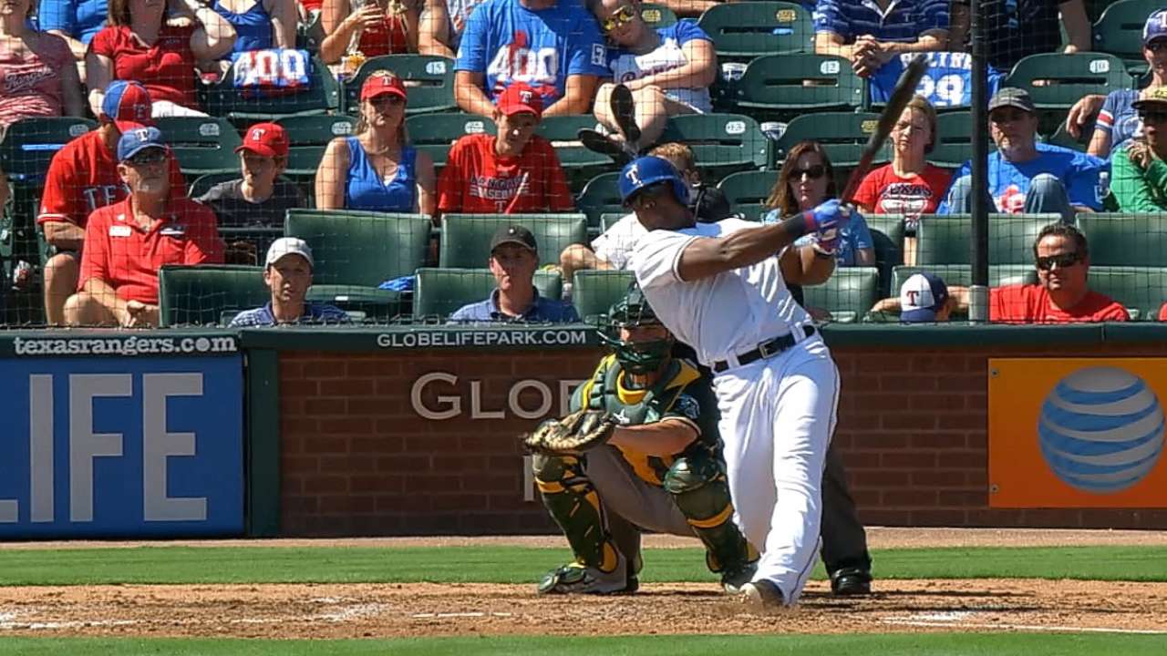 Rangers hit 4 HRs, keep pace out West