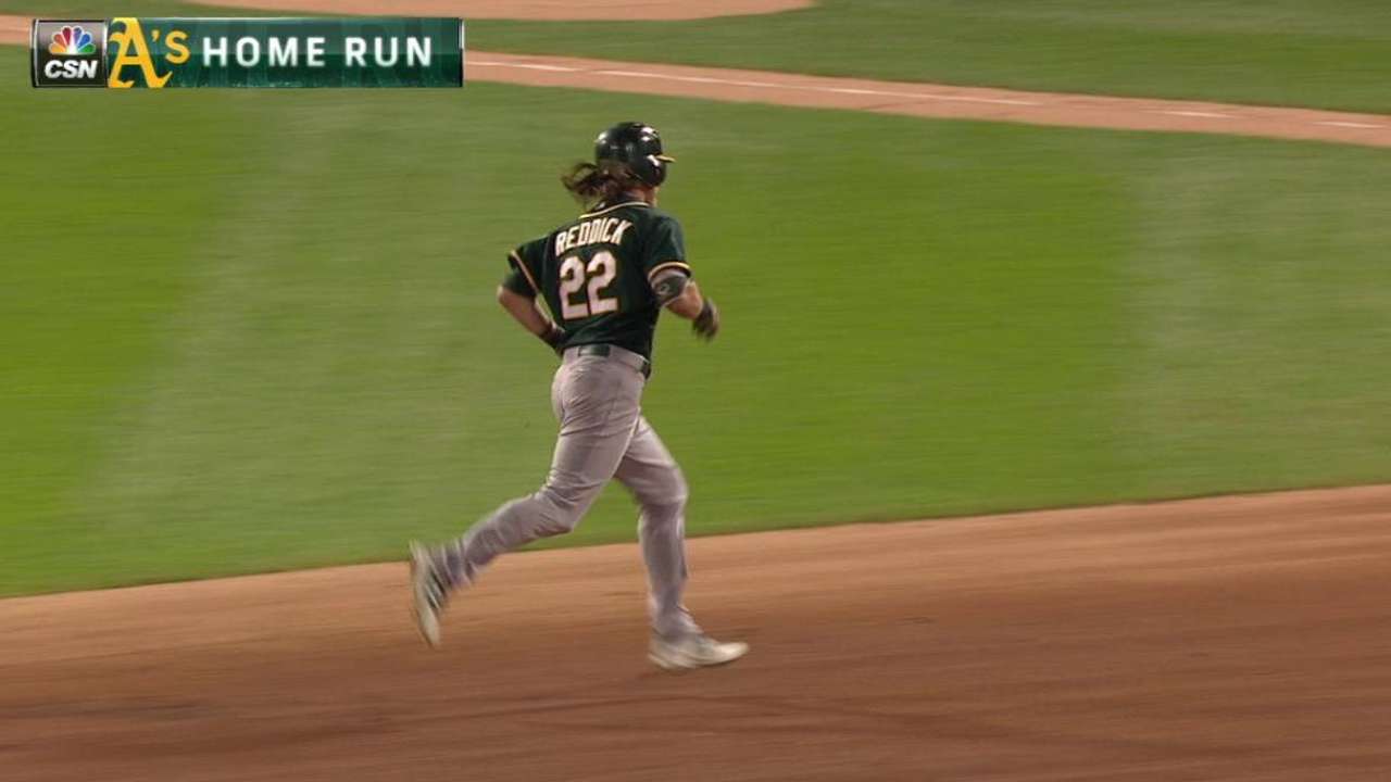 A's avoid arb with deals for Reddick, Rodriguez