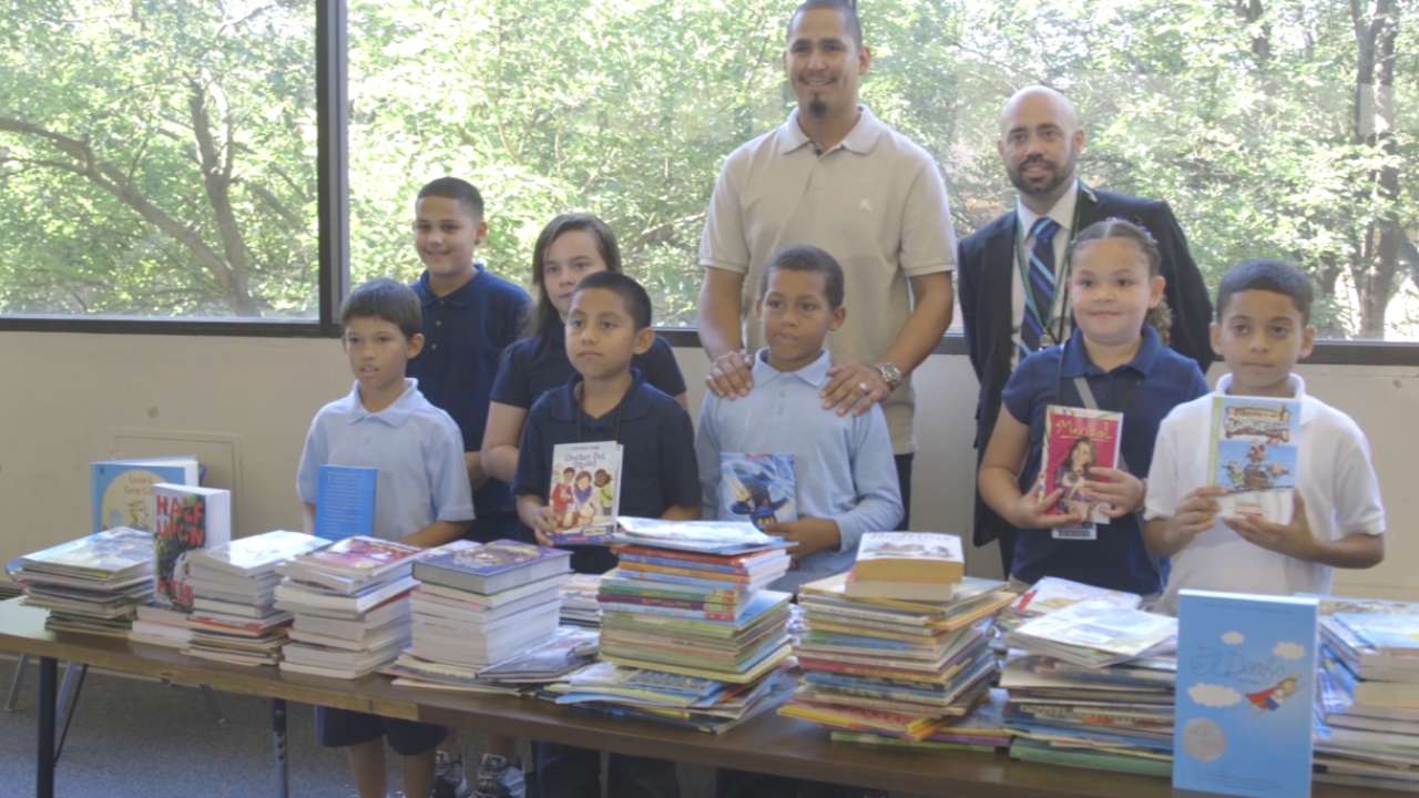Carrasco hits the books with young students